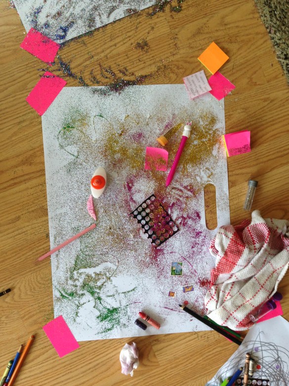 Another brilliant Daddy Idea, in fitting with her birthday theme of Pink, Purple, and Sparkly -- Glitter art project (what I later learned is referred to as the Herpes of the craft world).